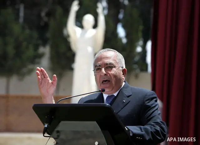 Palestinian Prime Minister Salam Fayyad attends simultaneous ceremony for the Beatification of the late Pope John Paul II and the unveiling of the first statue of him in the Middle East in direct satellite connection wit...