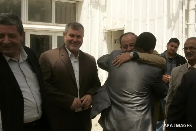 A Gaza Strip-based delegation with members of the Fatah party, the Popular Front for the Liberation of Palestine (PFLP) and the Islamic Jihad arrive at the Rafah border terminal in the southern Gaza Strip on May 02, 2011...