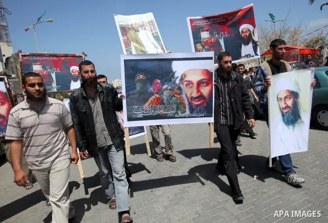Palestinians shout anti-US slogans during a protest in Gaza City on May 3, 2011 after the killing of Osama Bin Laden by US Special Forces in a ground operation in Pakistan's hill station of Abbottabad. Pakistan said that...