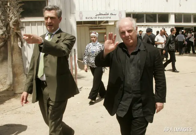 Israeli conductor Daniel Barenboim arrives to the Gaza Strip at the Rafah border terminal between Egypt and the Palestinian coastal strip on May 03, 2011 before his "peace concert" which marks the first time that Barenbo...