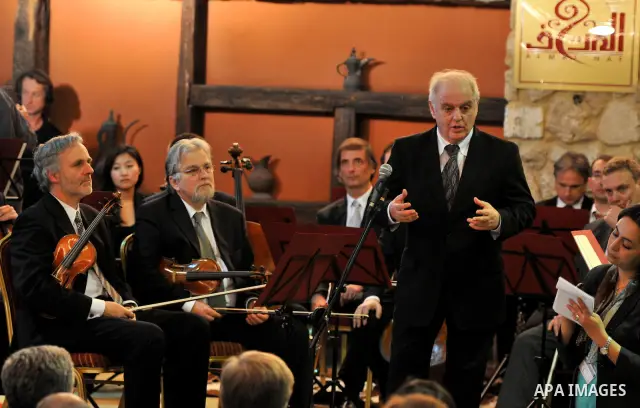 Israeli Maestro Daniel Barenboim, UN Messenger of Peace, conducts the Orchestra for Gaza, a mixed orchestra of European musicians, during concert at the Al Mathaf Cultural House in Gaza City, Tuesday, May, 3, 2011. Baren...