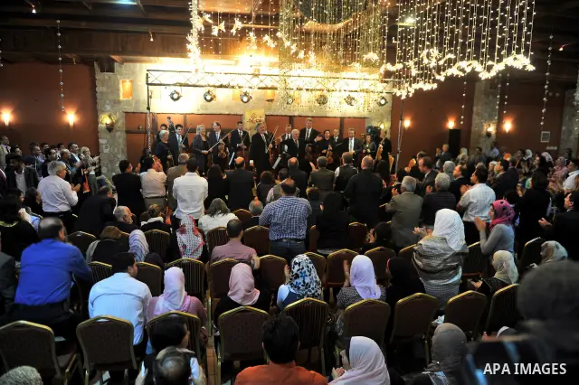 Israeli Maestro Daniel Barenboim, UN Messenger of Peace, conducts the Orchestra for Gaza, a mixed orchestra of European musicians, during concert at the Al Mathaf Cultural House in Gaza City, Tuesday, May, 3, 2011. Baren...
