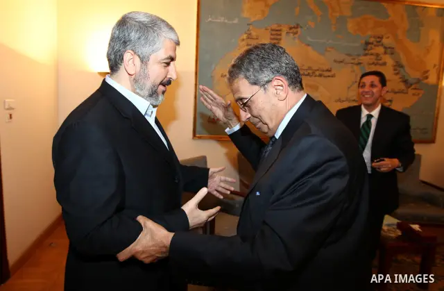 Arab League General Secretary Amr Mussa meets with Senior Hamas Leader Khaled Mashaal and senior Hamas members in Cairo on May 3, 2011. Palestinian factions signed a reconciliation deal in Cairo to end the divide between...