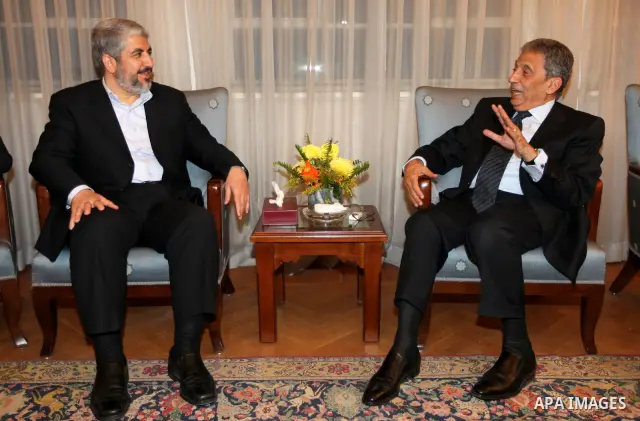 Arab League General Secretary Amr Mussa meets with Senior Hamas Leader Khaled Mashaal and senior Hamas members in Cairo on May 3, 2011. Palestinian factions signed a reconciliation deal in Cairo to end the divide between...