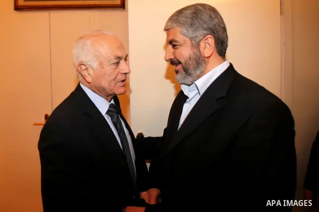 Egyptian Foreign Minister, Nabil al-Arabi meets with Senior Hamas Leader Khaled Mashaal in Cairo on May 3, 2011. Palestinian factions signed a reconciliation deal in Cairo to end the divide between the West Bank and Gaza...
