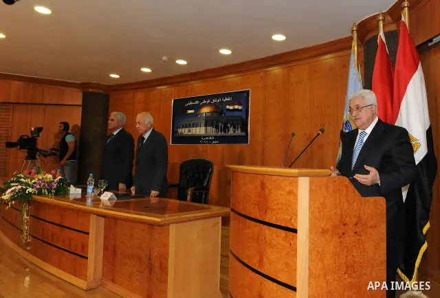 Palestinian President Mahmoud Abbas (Abu Mazen) attends the signing of reconciliation agreement in Cairo, Egypt on May 4,2011. Fatah and Hamas officials lead a ceremony celebrating the signing of a reconciliation deal in...