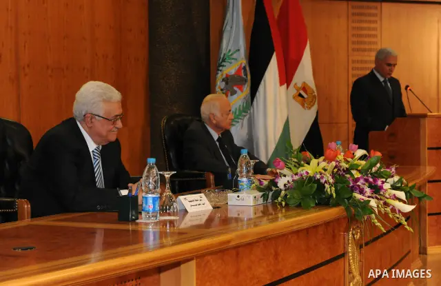Palestinian President Mahmoud Abbas (Abu Mazen) attends the signing of reconciliation agreement in Cairo, Egypt on May 4,2011. Fatah and Hamas officials lead a ceremony celebrating the signing of a reconciliation deal in...