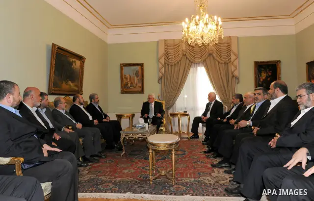 Palestinian President Mahmoud Abbas (Abu Mazen) meets with Hamas delegation headed by Senior Hamas leader Khaled Mashaal in Cairo, Egypt on May 4,2011. Fatah and Hamas officials lead a ceremony celebrating the signing of...