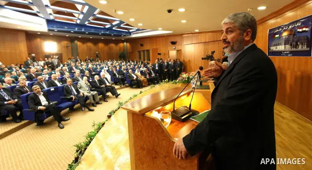 Senior Hamas leader Khaled Mashaal attends the signing of reconciliation agreement in Cairo, Egypt on May 4,2011. Fatah and Hamas officials lead a ceremony celebrating the signing of a reconciliation deal intended to rep...