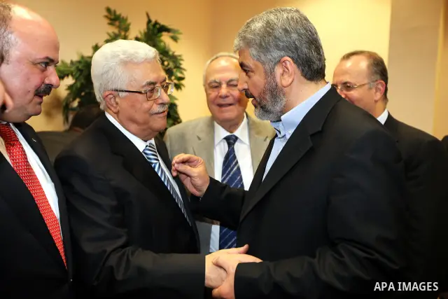Senior Hamas leader Khaled Mashaal attends the signing of reconciliation agreement in Cairo, Egypt on May 4,2011. Fatah and Hamas officials lead a ceremony celebrating the signing of a reconciliation deal intended to rep...