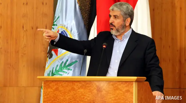 Senior Hamas leader Khaled Mashaal attends the signing of reconciliation agreement in Cairo, Egypt on May 4,2011. Fatah and Hamas officials lead a ceremony celebrating the signing of a reconciliation deal intended to rep...