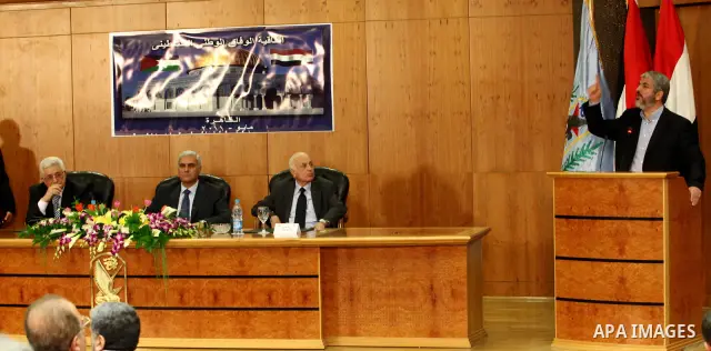 Senior Hamas leader Khaled Mashaal attends the signing of reconciliation agreement in Cairo, Egypt on May 4,2011. Fatah and Hamas officials lead a ceremony celebrating the signing of a reconciliation deal intended to rep...