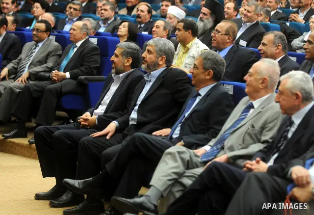 Senior Hamas leader Khaled Mashaal attends the signing of reconciliation agreement in Cairo, Egypt on May 4,2011. Fatah and Hamas officials lead a ceremony celebrating the signing of a reconciliation deal intended to rep...