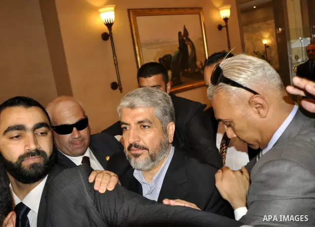 Senior Hamas leader, Khaled Mashaal leaves a hotel in Cairo, Egypt on May 4,2011. Fatah and Hamas officials lead a ceremony celebrating the signing of a reconciliation deal intended to repair ties between the rival movem...