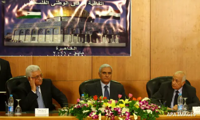Palestinian President Mahmoud Abbas (Abu Mazen) attends the signing of reconciliation agreement in Cairo, Egypt on May 4,2011. Fatah and Hamas officials lead a ceremony celebrating the signing of a reconciliation deal in...