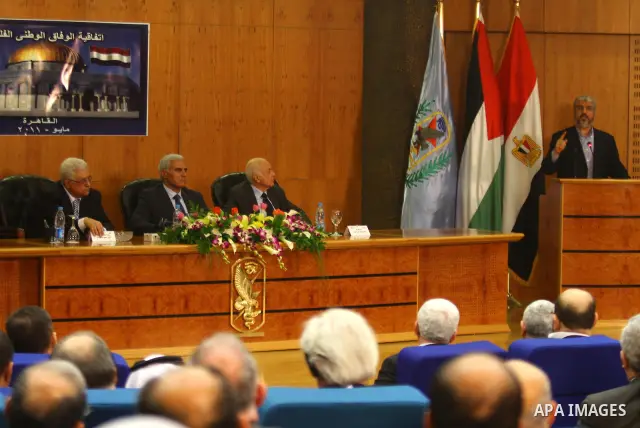 Senior Hamas leader Khaled Mashaal delivers speech during the signing of reconciliation agreement in Cairo, Egypt on May 4,2011. Fatah and Hamas officials lead a ceremony celebrating the signing of a reconciliation deal...