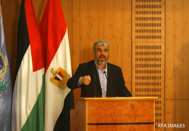Senior Hamas leader Khaled Mashaal delivers speech during the signing of reconciliation agreement in Cairo, Egypt on May 4,2011. Fatah and Hamas officials lead a ceremony celebrating the signing of a reconciliation deal...
