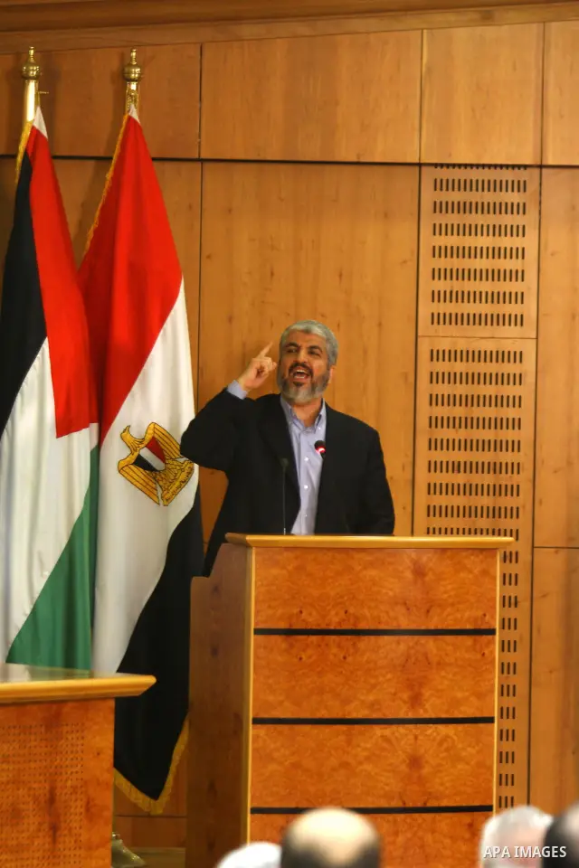 Senior Hamas leader Khaled Mashaal delivers speech during the signing of reconciliation agreement in Cairo, Egypt on May 4,2011. Fatah and Hamas officials lead a ceremony celebrating the signing of a reconciliation deal...