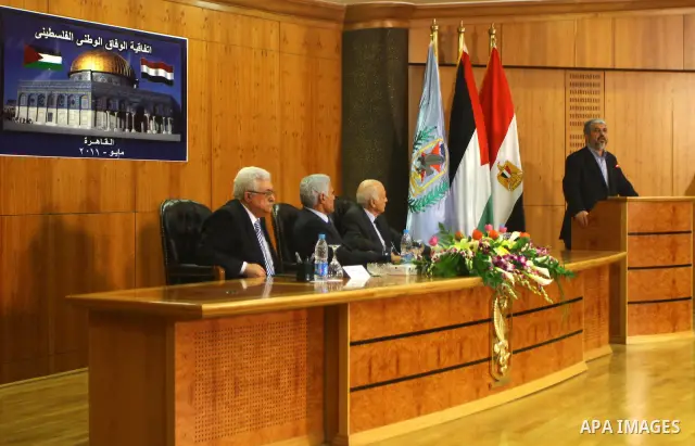 Senior Hamas leader Khaled Mashaal delivers speech during the signing of reconciliation agreement in Cairo, Egypt on May 4,2011. Fatah and Hamas officials lead a ceremony celebrating the signing of a reconciliation deal...