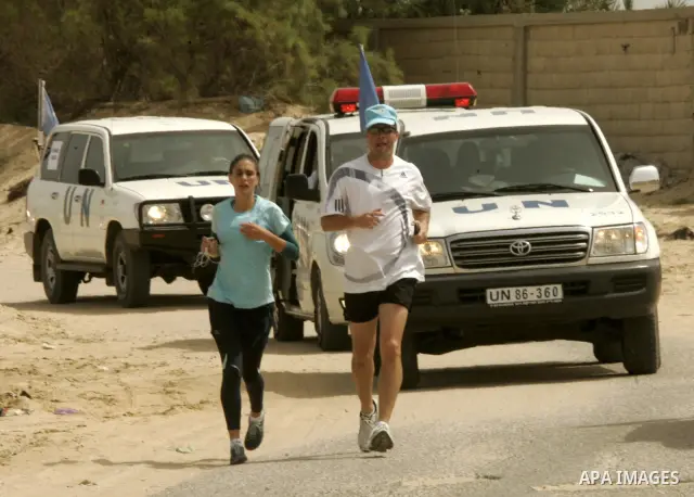 UNRWA (United Nations Relief and Works Agency for Palestine refugees) staffer Gemma Connell runs in Gaza Strip's first-ever marathon on May 5, 2011 in Rafah, southern Gaza Strip. More than 1,400 Palestinians were up befo...