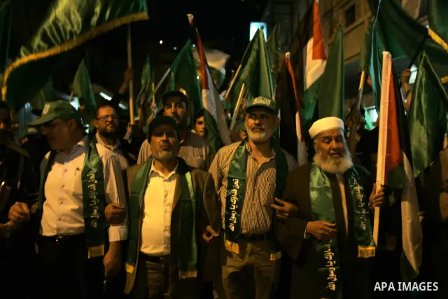 Palestinian Hamas supporters rally in the streets of the West Bank city of Nablus to celebrate on May 5, 2011 the political unity reconciliation deal between the Islamic group and the Fatah movement which was signed by t...
