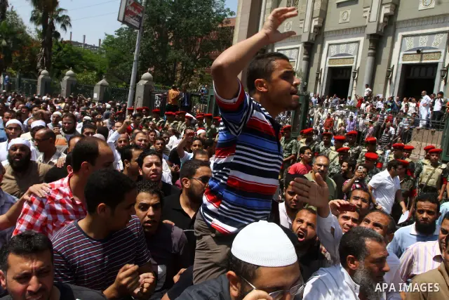 Egyptian Islamists shout slogans during a march to the US embassy after the weekly Friday prayer in Cairo on May 6, 2011, during a demonstration to denounce the killing of Osama bin Laden by US forces in Pakistan. Photo...