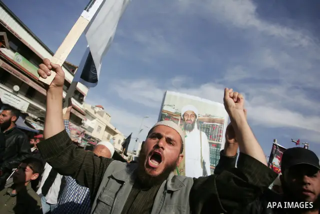 Palestinian Salafist groups, carrying pictures of late Al-Qaeda chief Osama bin Laden, march at Gaza central square, in Gaza city on May 7, 2011, during a demonstration to denounce the killing of bin Laden by US forces i...