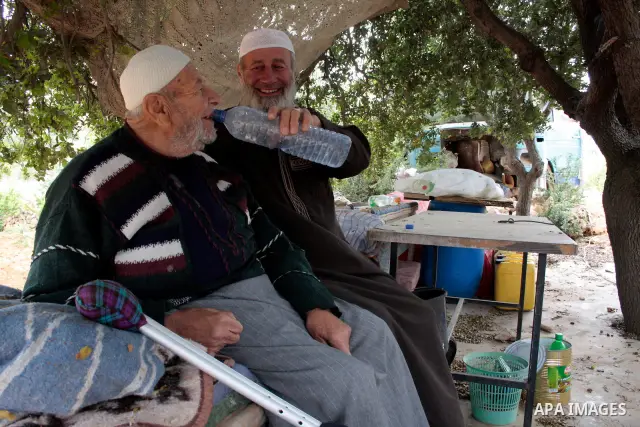 A Palestinian Sheikh Abed el-Haseeb Zaloum, 78 years, lives in a damaged bus, since his house was demolished before ten years by Israeli bulldozers near the Jewish settlement of Karyat Arbaa, in the West Bank city of Heb...