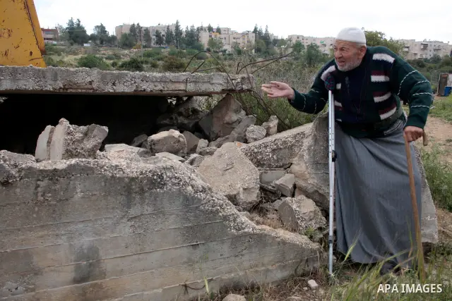 A Palestinian Sheikh Abed el-Haseeb Zaloum, 78 years, lives in a damaged bus, since his house was demolished before ten years by Israeli bulldozers near the Jewish settlement of Karyat Arbaa, in the West Bank city of Heb...