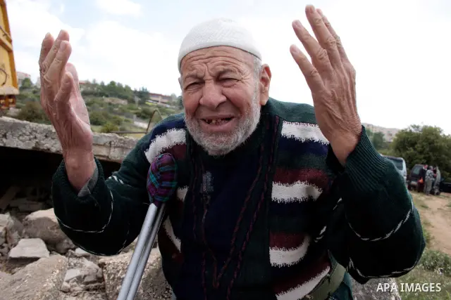 A Palestinian Sheikh Abed el-Haseeb Zaloum, 78 years, lives in a damaged bus, since his house was demolished before ten years by Israeli bulldozers near the Jewish settlement of Karyat Arbaa, in the West Bank city of Heb...