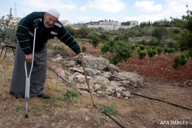 A Palestinian Sheikh Abed el-Haseeb Zaloum, 78 years, lives in a damaged bus, since his house was demolished before ten years by Israeli bulldozers near the Jewish settlement of Karyat Arbaa, in the West Bank city of Heb...