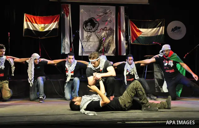 Egyptians and Palestinians gather in celebration To support the third intifada in El- Sawi Hall in Cairo, on May 7, 2011. Photo by Ahmed Asad