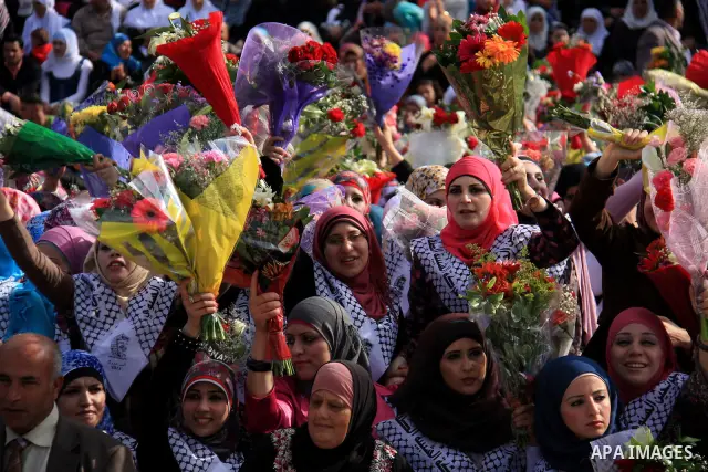 Palestinian students from the Fatah movement take part in a rally during their graduation ceremony at A-Najah University in the West Bank city of Nablus, Sunday, May 8, 2011. Photo by Wagdi Eshtayah