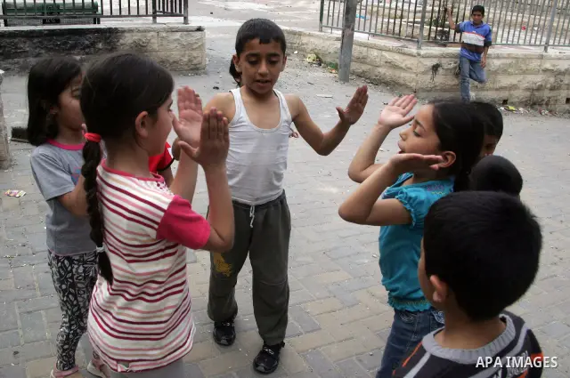 Palestinians children play in the street in the East Jerusalem neighborhood of Silwan, on May 08, 2011. Photo by Mahfouz Abu Turk
