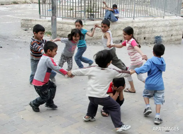 Palestinians children play in the street in the East Jerusalem neighborhood of Silwan, on May 08, 2011. Photo by Mahfouz Abu Turk