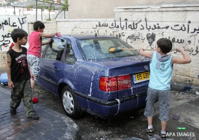 Palestinians children play in the street in the East Jerusalem neighborhood of Silwan, on May 08, 2011. Photo by Mahfouz Abu Turk