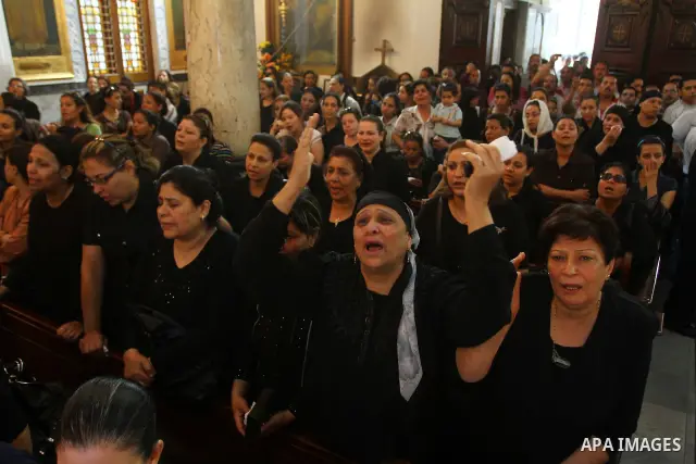 Egyptian Coptic Christian women mourn during the funeral of a victim of sectarian clashes in Cairo on May 8, 2011 as Egypt's military rulers warned they will use an "iron hand" to protect national security after clashes...
