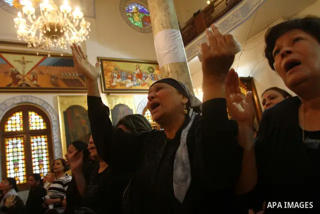 Egyptian Coptic Christian women mourn during the funeral of a victim of sectarian clashes in Cairo on May 8, 2011 as Egypt's military rulers warned they will use an "iron hand" to protect national security after clashes...