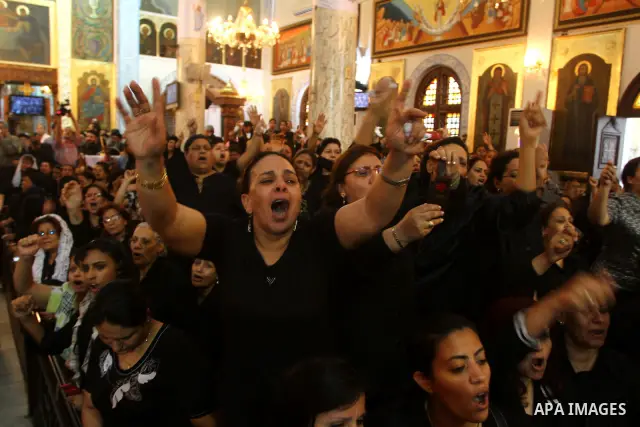 Egyptian Coptic Christian women mourn during the funeral of a victim of sectarian clashes in Cairo on May 8, 2011 as Egypt's military rulers warned they will use an "iron hand" to protect national security after clashes...