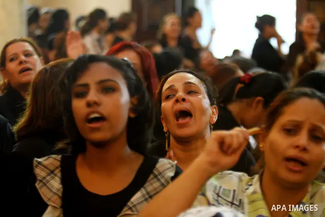 Egyptian Coptic Christian women mourn during the funeral of a victim of sectarian clashes in Cairo on May 8, 2011 as Egypt's military rulers warned they will use an "iron hand" to protect national security after clashes...