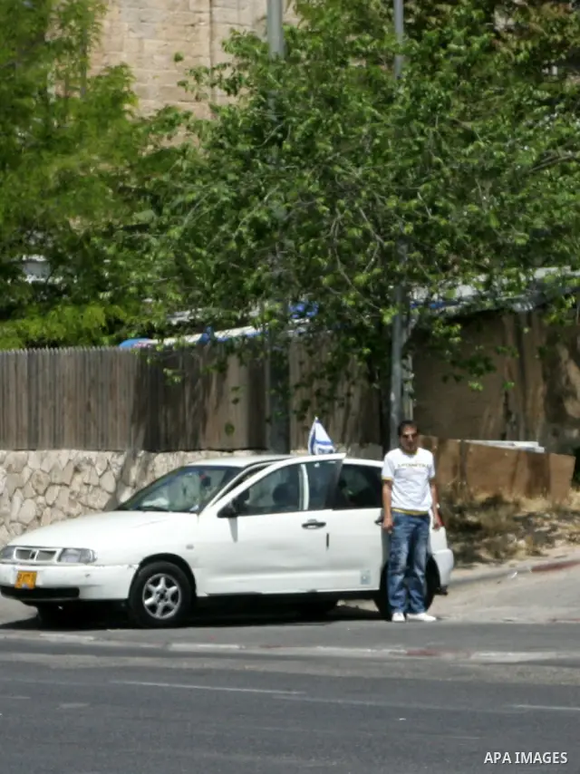 Israelis observe two minutes of silence as a siren wails across the country marking Remembrance Day for the fallen soldiers, in east Jerusalem, on May 9, 2011. Remembrance Day is followed immediately by the 63rd annivers...