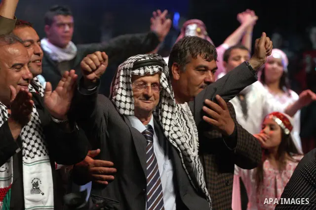 Palestinian revolution poet Ibrahim Abu Saleh ''Abu Arab" participates in a celebration in the West Bank city of Ramallah, Sunday, May 8, 2011 to commemorate the 63rd anniversary of Nakba, or catastrophe, the Arabic term...