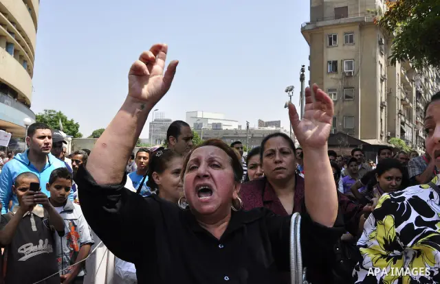 Egyptian Christians protest in front of the state television building in Cairo on May 9, 2011 against recent attempts to trigger sectarian conflict in the country, as the government has vowed to use an "iron fist" to ens...