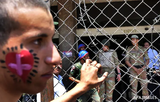 Egyptian Christians protest in front of the state television building in Cairo on May 9, 2011 against recent attempts to trigger sectarian conflict in the country, as the government has vowed to use an "iron fist" to ens...