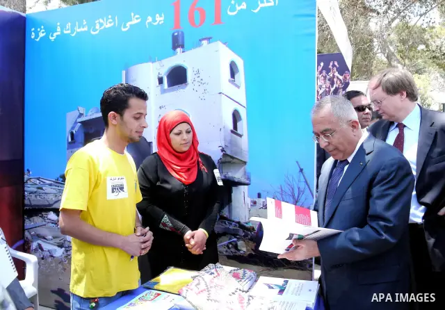 Palestinian Prime Minister, Salam Fayyad participates in a celebration to mark "Europe Day" in the West Bank city of Ramallah on May 9, 2011. France announced it would donate 10 million euros to the Palestinian Authority...