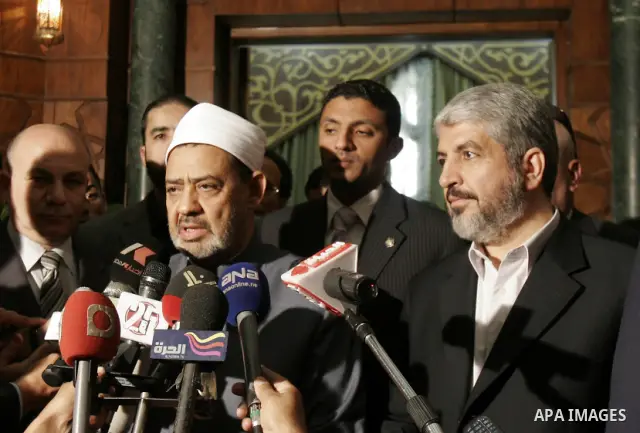 Hamas leader Khaled Mashaal meets with Ahmed al-Tayyeb, the sheikh of al-Azhar, the highest Islamic Sunni institution, during his visit in Cairo, Egypt, Monday, May 9, 2011. Photo by Ahmed Asad