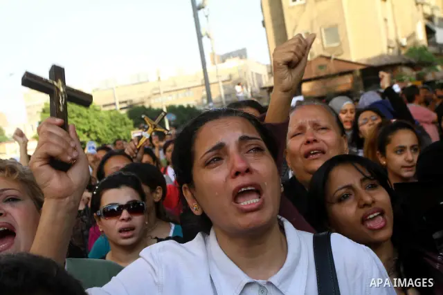 Egyptian Christians protest in front of the state television building in Cairo on May 9, 2011 against recent attempts to trigger sectarian conflict in the country, as the government has vowed to use an "iron fist" to ens...