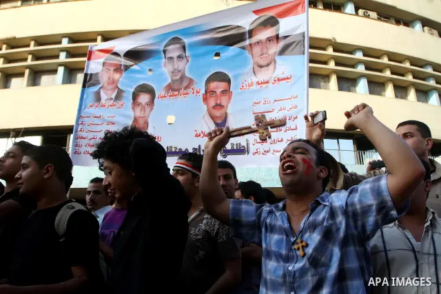 Egyptian Christians protest in front of the state television building in Cairo on May 9, 2011 against recent attempts to trigger sectarian conflict in the country, as the government has vowed to use an "iron fist" to ens...