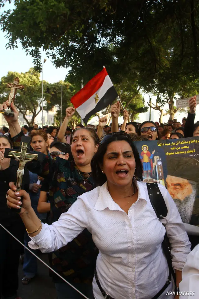 Egyptian Christians protest in front of the state television building in Cairo on May 9, 2011 against recent attempts to trigger sectarian conflict in the country, as the government has vowed to use an "iron fist" to ens...