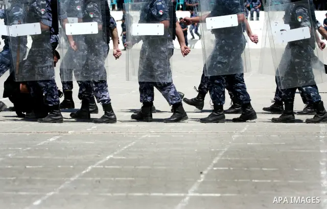 Palestinian Hamas security forces show their skills during a graduation ceremony at the Arafat police compound in Gaza City on May 10, 2011. Photo by Mohammed Othman
